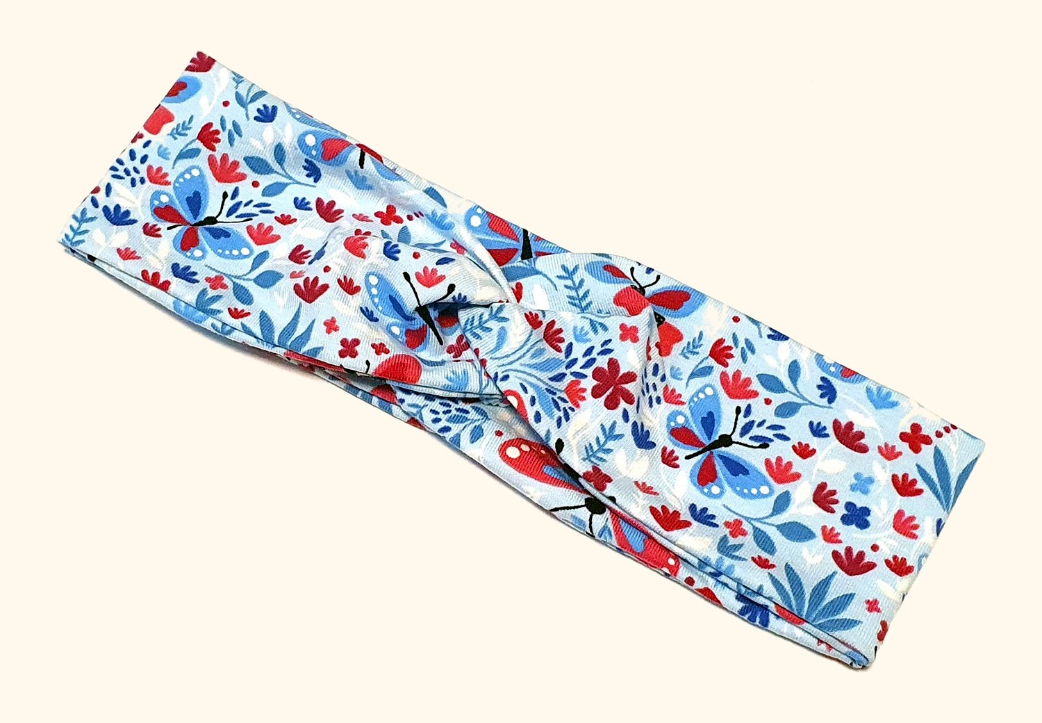 Blaues Stirnband mit Schmetterlingen